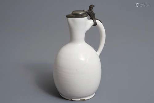 A white Dutch Delft jug with pewter cover, 17th C.