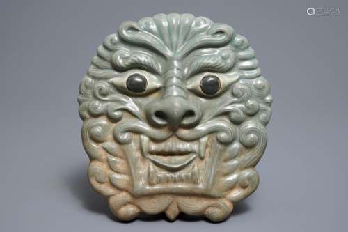 A Korean celadon-glazed mask, Goryeo or later