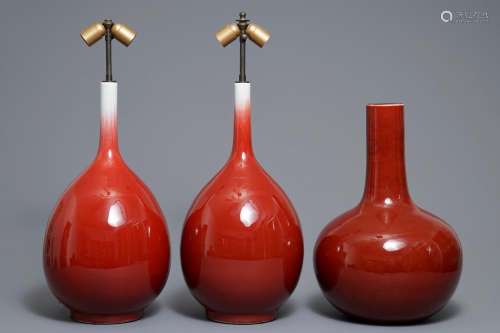 Three Chinese sang-de-boeuf-glazed bottle vases, 20th C.