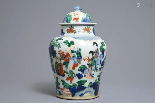 A Chinese wucai baluster vase and cover with playing boys, Transitional period