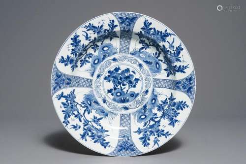 A Chinese blue and white charger with floral design, Kangxi