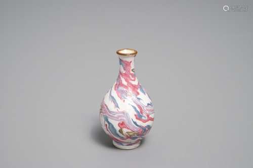 An unusual small Chinese faux-marbre glazed vase, 18th C.