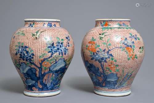 A pair of Chinese wucai jars with birds and flowers, Transitional period