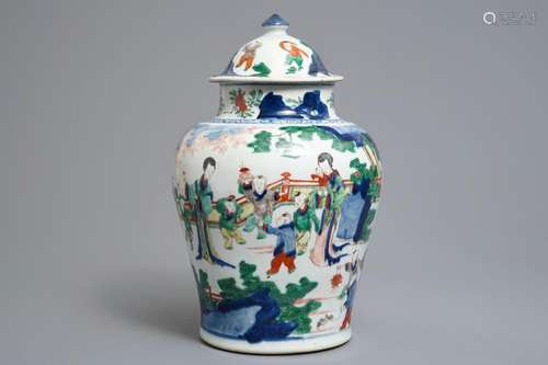 A Chinese wucai vase with ladies watching over playing boys, Transitional period