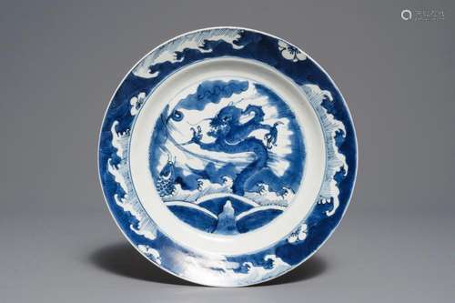 A Chinese blue and white 'dragon and carp' dish, Kangxi