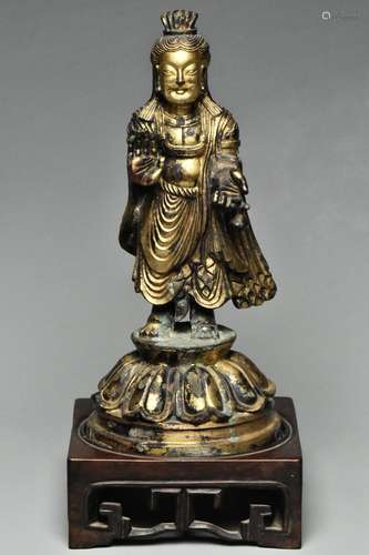 A TANG DYNASTY GILT BRONZE BUDDHA AND STAND