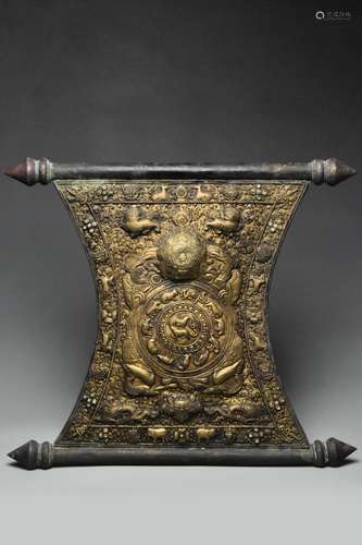 A MING DYNASTY GILT COPPER REPOUSSE PLAQUE