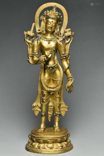 A SINO-TIBETAN GILT BRONZE AVALOKITESHVARA