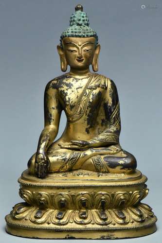 A SINO-TIBETAN GILT BRONZE FIGURE OF BUDDHA