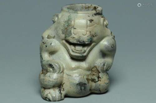 A HAN DYNASTY JADE BEAR-FORM SUPPORT