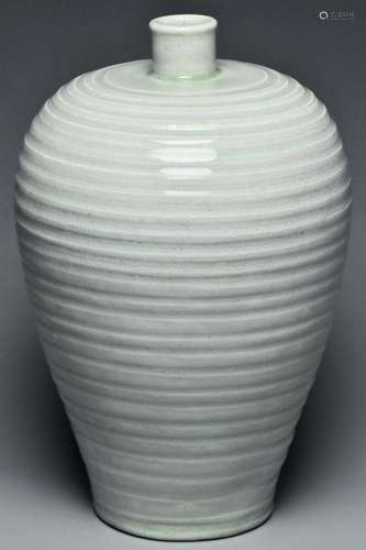 A SONG DYNASTY CARVED QINGBAI MEIPING VASE