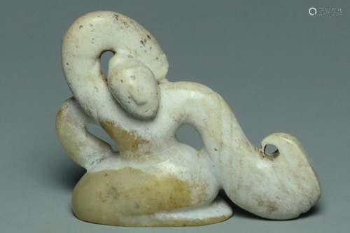 A HAN DYNASTY CALCIFIED JADE FIGURE OF A DANCER