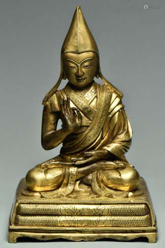 A SINO-TIBETAN GILT BRONZE FIGURE OF TSONGKAPA