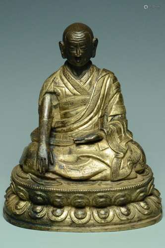 INSCRIBED TIBETAN QING DYNASTY GILT BRONZE LAMA