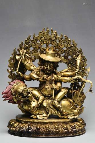 A SINO-TIBETAN GILT BRONZE FIGURE OF MAHAKALA