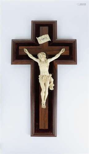 Christ en ivoire, sur une croix en bois. H_51 cm ...