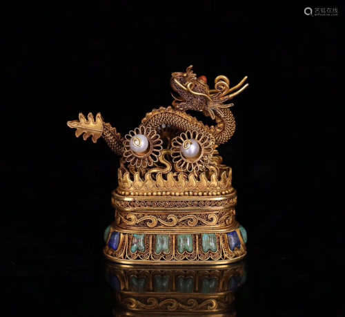 A GOLD MOLDED DRAGON SHAPED CENSER