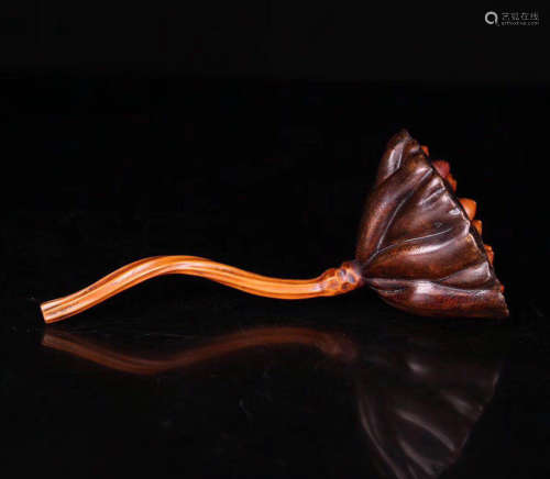 A CHENXIANG WOOD CARVED LOTUS SEEDPOD ORNAMENT