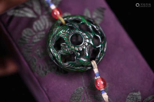 A QIUJIAO HOLLOW CARVED PENDANT