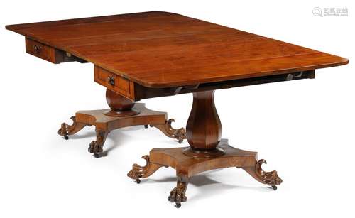 An unusual William IV mahogany dining table, in the form of a pair of Pembroke tables, each with a