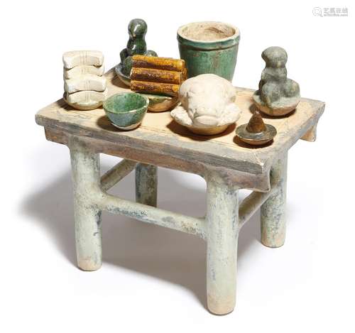 A Chinese pottery altar in Han Dynasty style, together with part glazed pottery offerings,