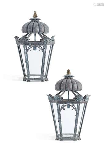 A pair of copper hall lanterns in Regency style by Jamb, each with a verdigris finish and a gilt