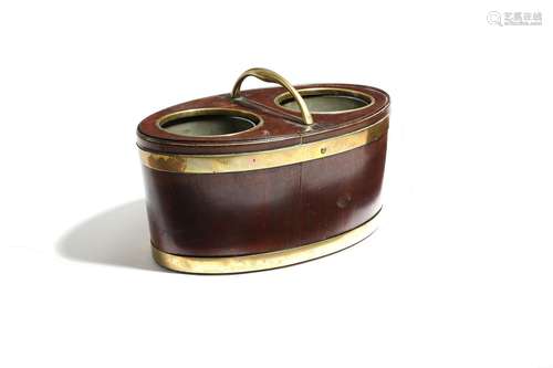 A George III mahogany brass mounted navette shape bottle cooler, the top with twin hinged lids