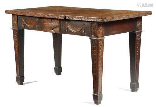 A mahogany side table in Adam style, the breakfront top with a guilloche carved edge, above a frieze