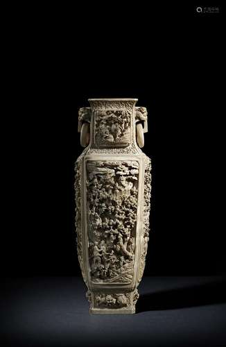 λ A massive 19th century Chinese ivory vase, the rectangular body finely and elaborately carved,