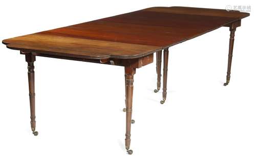 A Regency Scottish mahogany extending dining table, in the manner of William Trotter, the drop-