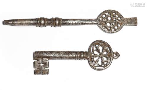 Two 16th century Italian iron keys, one Venetian with a hexafoil Gothic bow and a zigzag decorated