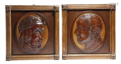 A pair of 19th century walnut and parcel gilt portrait reliefs, of Dante and John Henry Newman,