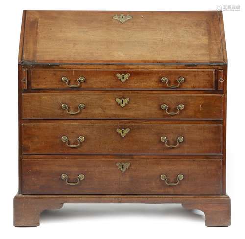 A late George II mahogany bureau, the hinged fall revealing a bank of six drawers and pigeonholes,