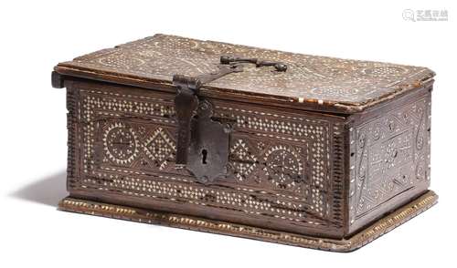 A Mudejar walnut and bone casket, inlaid with geometric designs, stars and crosses, with an iron