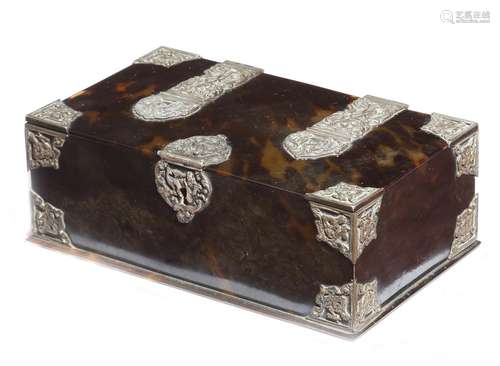 λ A Dutch colonial tortoiseshell casket, with silver plated repoussé mounts and strapwork hinges,