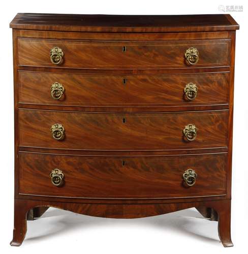 An early 19th century Channel Islands mahogany bowfront chest, inlaid with stringing, the