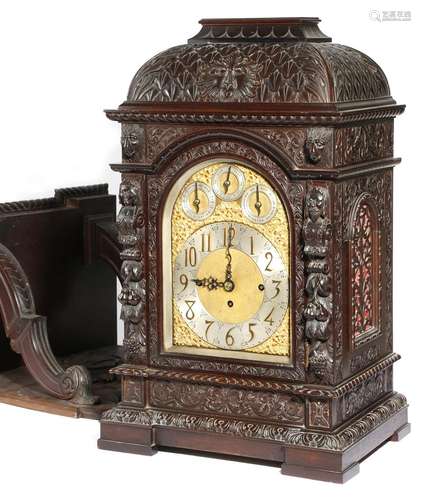 A large late Victorian carved mahogany Westminster chiming bracket clock, the eight day three