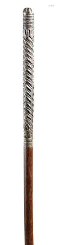 A late 19th century sword stick, the horn handle carved with a dog's head, with a brass ferrule