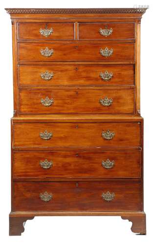 A George III mahogany chest on chest, with a Greek key moulded cornice, above two short and three