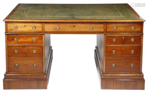 A Victorian mahogany twin pedestal partner's desk, the moulded edge top inset with gilt tooled green