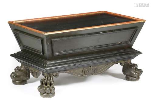 An ebonised and green painted wood sarcophagus shape wine cooler, the later lift-off top revealing a