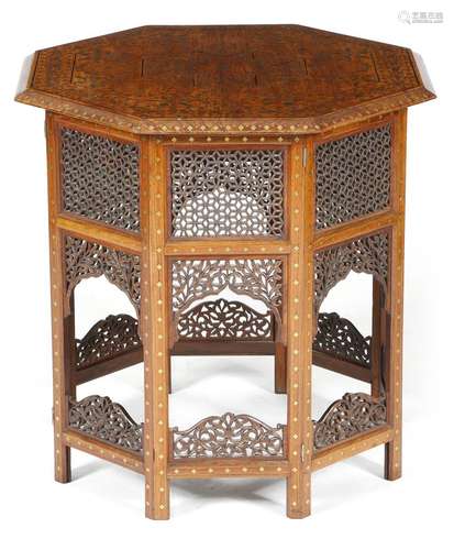 An Anglo-Indian hardwood octagonal occasional table, inlaid with copper, brass and ebony with a