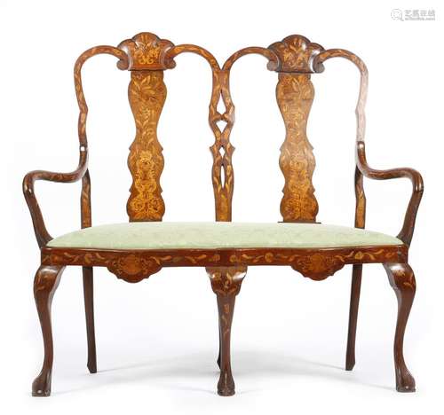 A 19th century Dutch mahogany and marquetry twin chair back settee, inlaid with urns of flowers