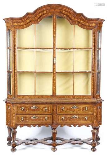 A Dutch walnut and marquetry display cabinet on stand, inlaid with flowers and leaves, with an