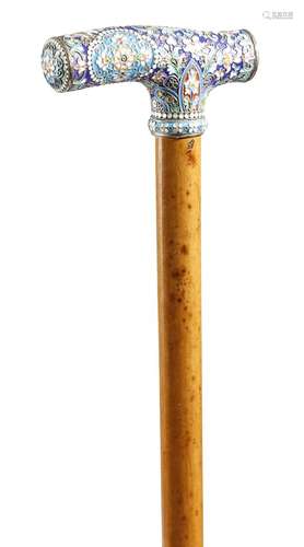 A Russian cloisonné enamel and silver mounted walking cane, the handle decorated with leaves and