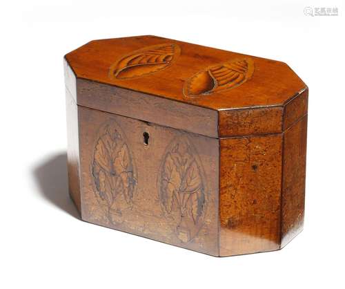 A George III fruitwood tea caddy, of canted rectangular form, inlaid with marquetry panels of