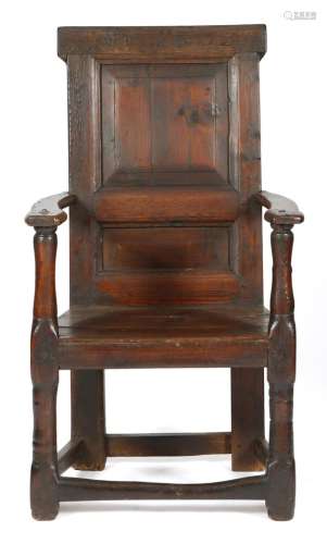 A George II Scottish pine and oak panelled back open armchair, the top rail incised with initials 'W