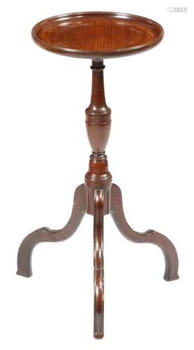 A George III mahogany tripod wine table, the later dished top on a vase turned stem and channelled