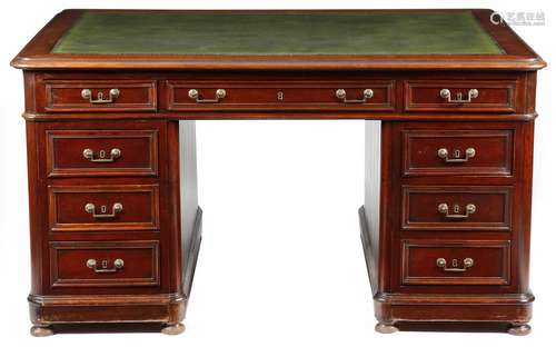 A late Victorian mahogany twin pedestal partner's desk, the top inset with later gilt tooled green