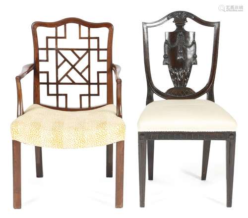 A stained wood side chair in Hepplewhite style, the shield shape back with a tasselled urn splat,